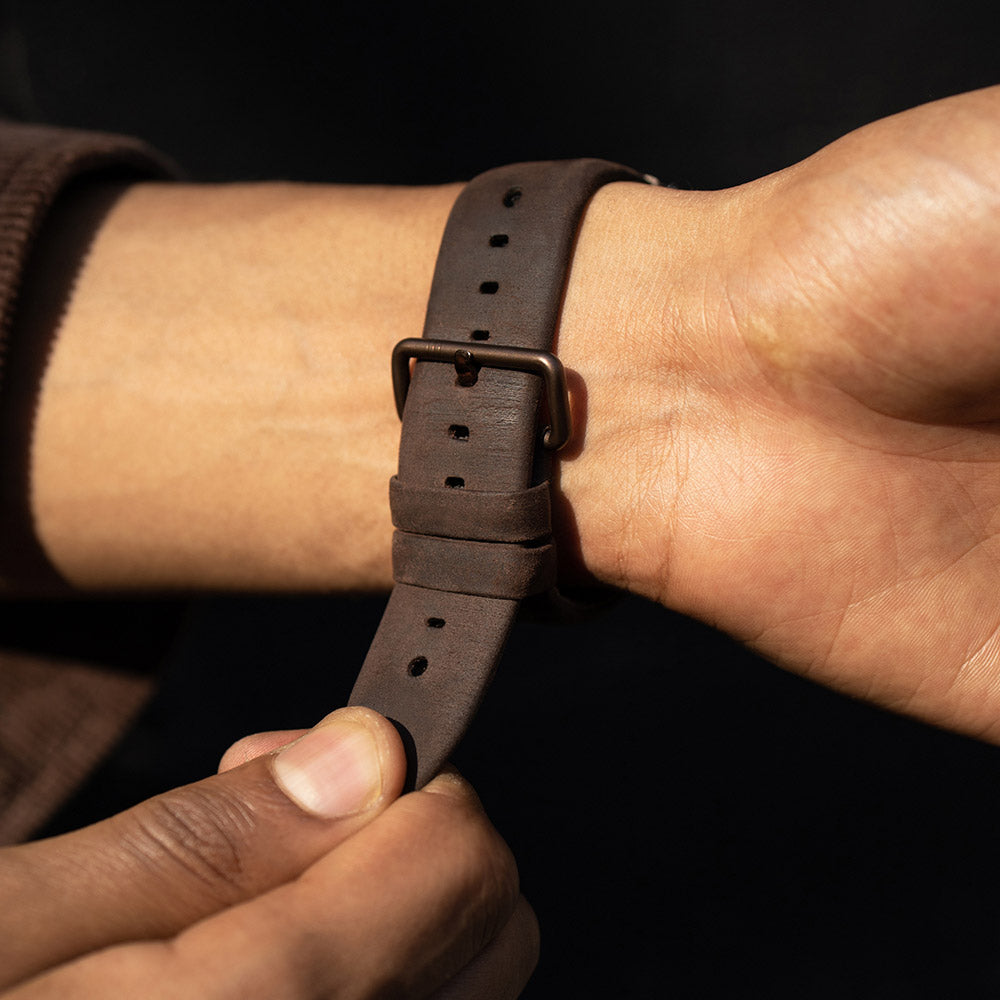 Check this out:Brown leather strap with buckle
